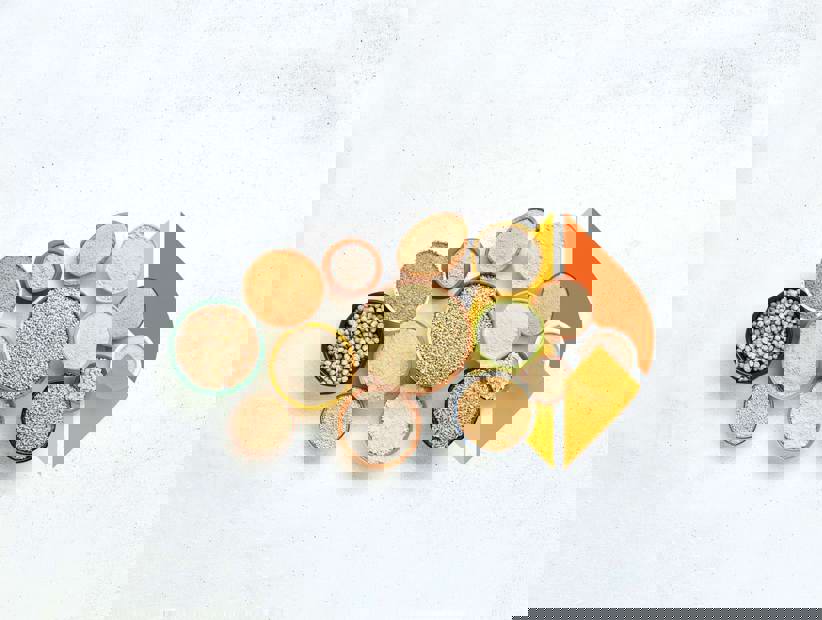 Bowls of alternative grains with the Ardent Mills logo